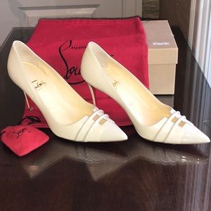 Christian Louboutin.  Size 6.5.